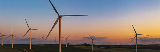 Drone view of a wind farm. Multiple wind turbines