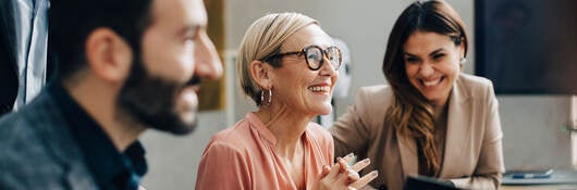 Three smiling coworkers