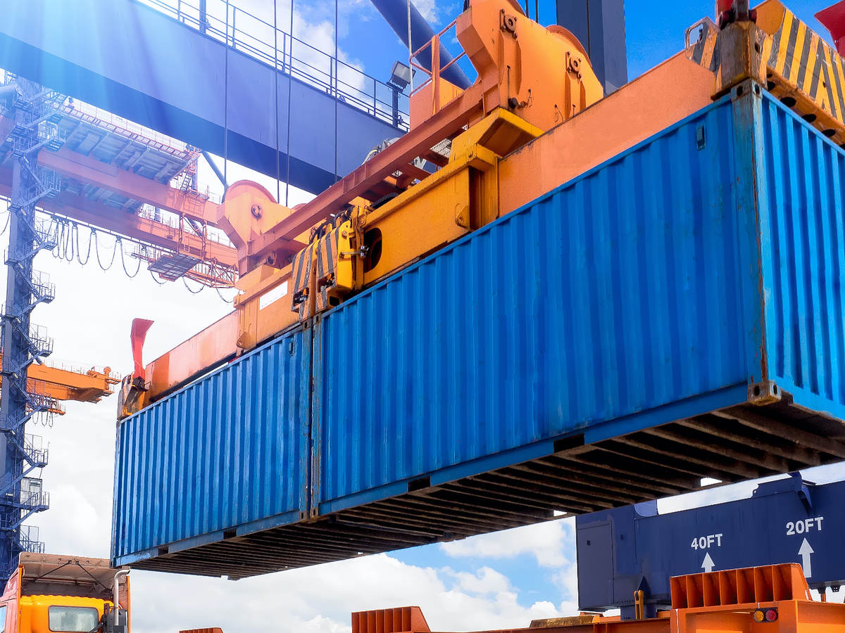 View Of Commercial Dock with containers Against Sky 