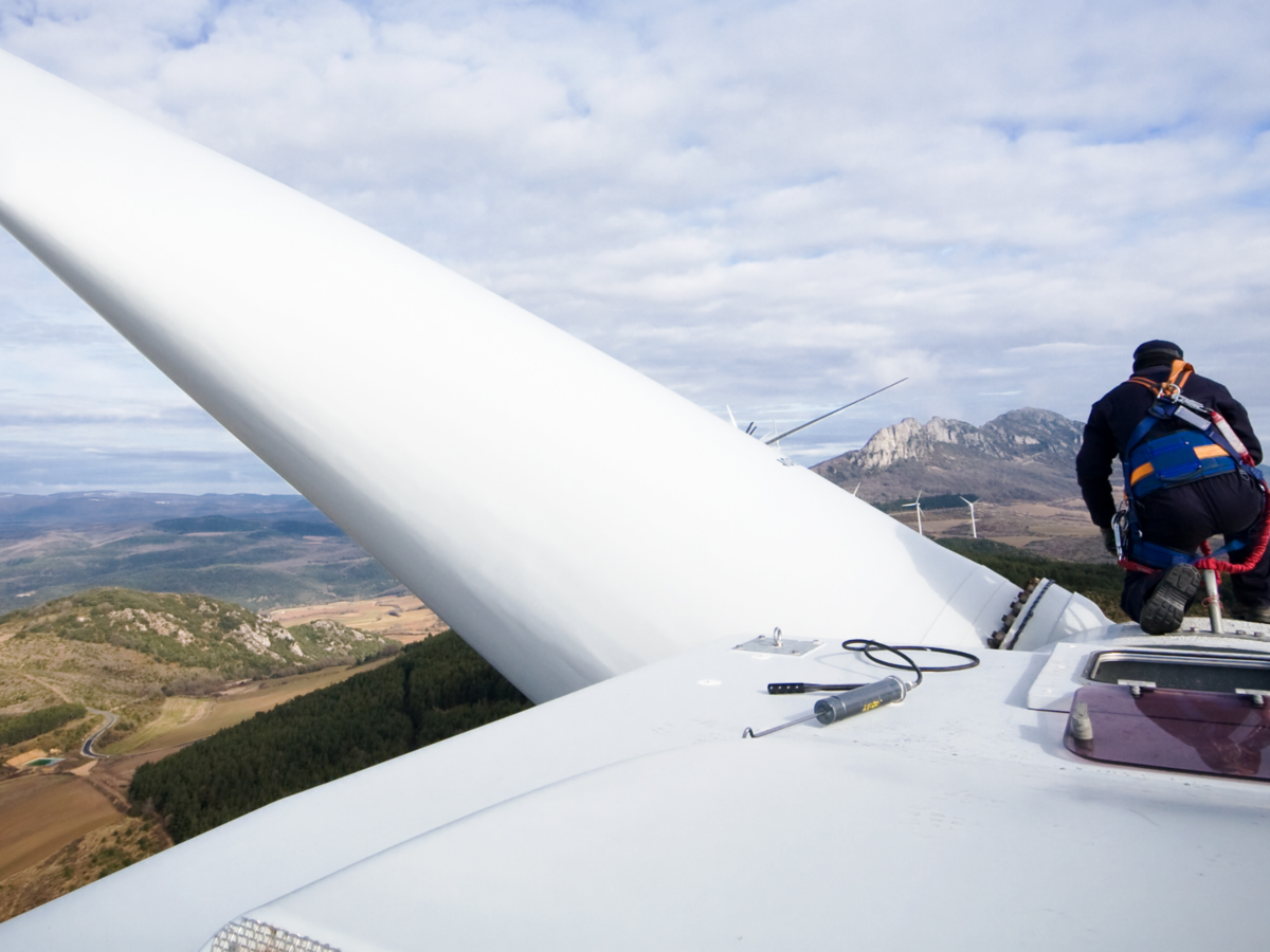 Employee fixing an airplane's wings