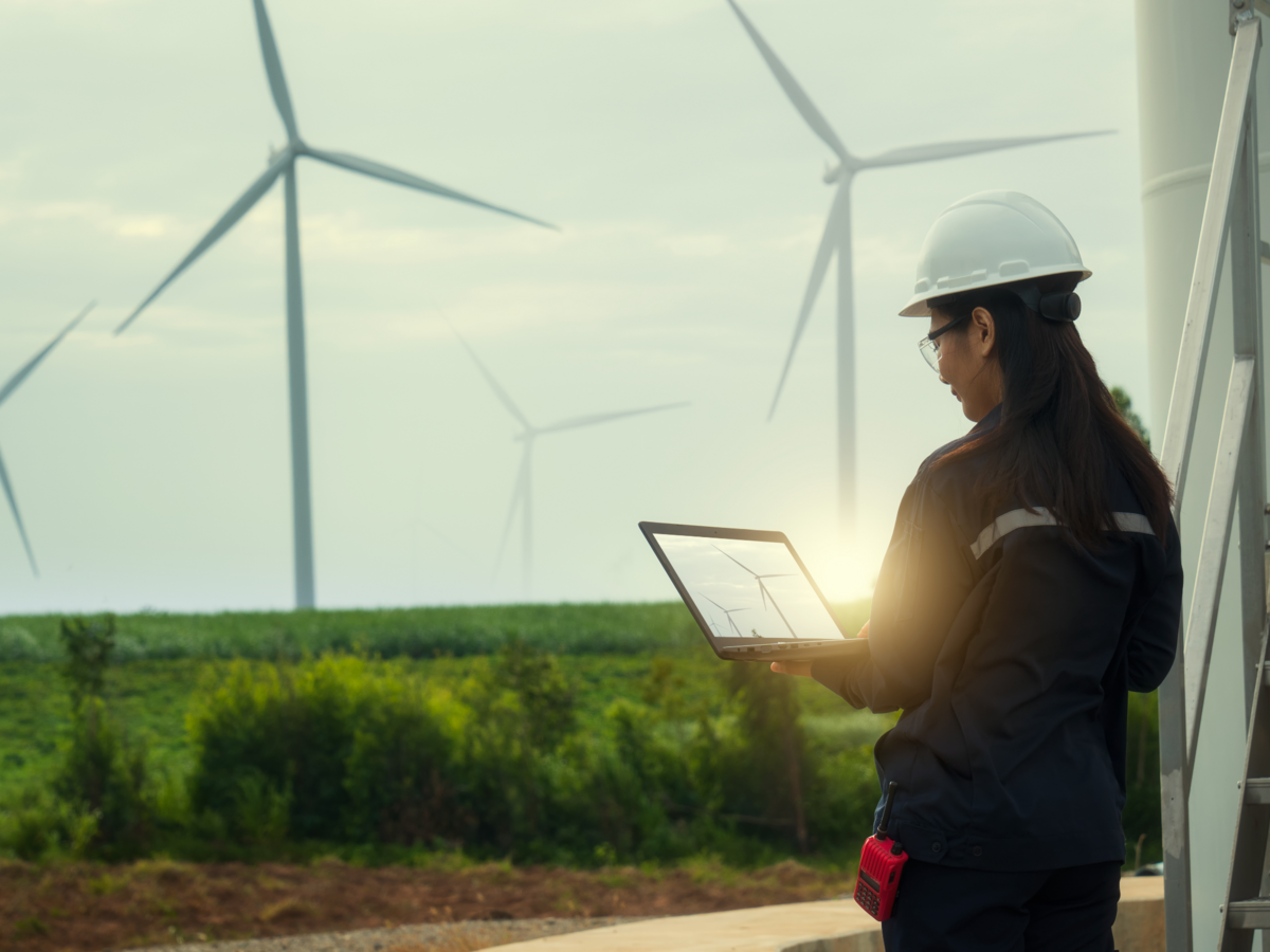 Technician testing wind turbines