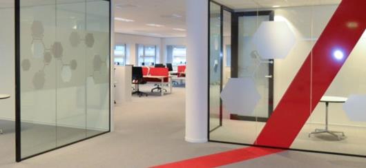 Office Lobby With Bright Red Stripe Running Across Floor And Wall