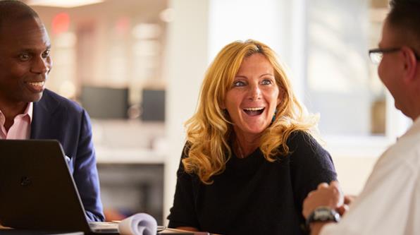 Woman at a table during an interview