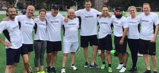 Sports Team Posing On The Field