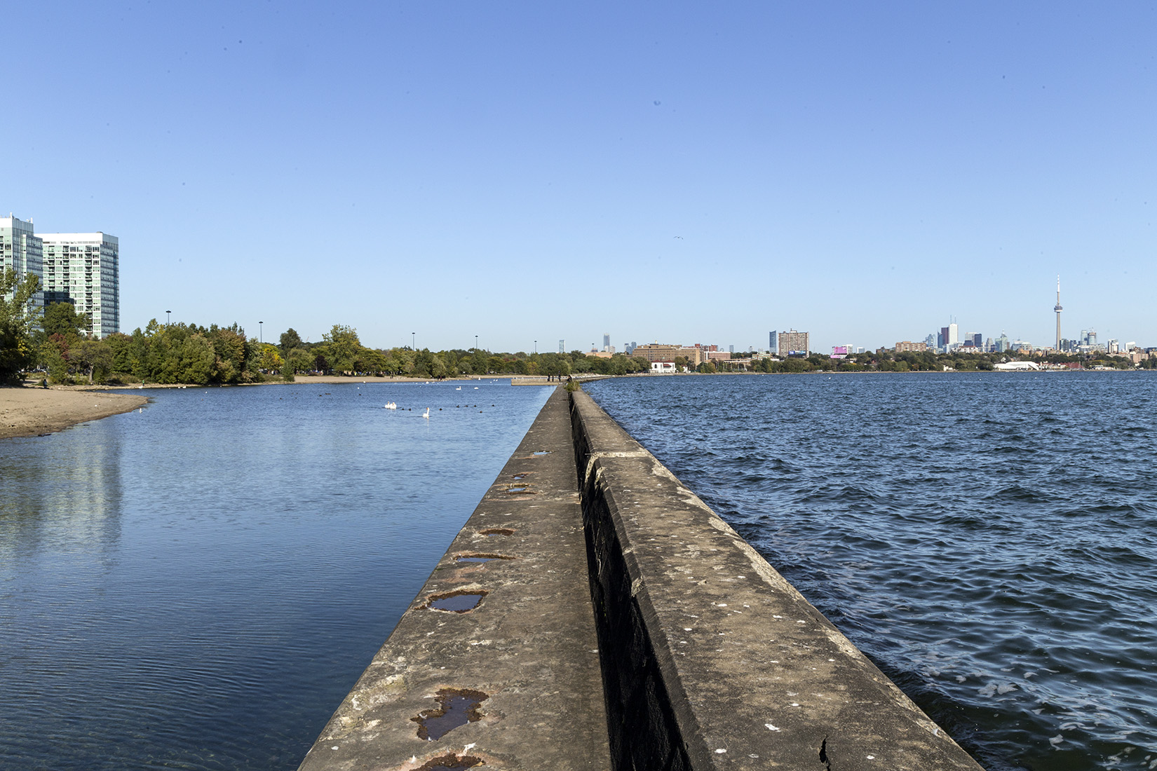 The breakwater was constructed from 1920-1925 to reduce erosion on the lake-filled shore and provide protected waters for boating but as can be seen, it is in bad condition.