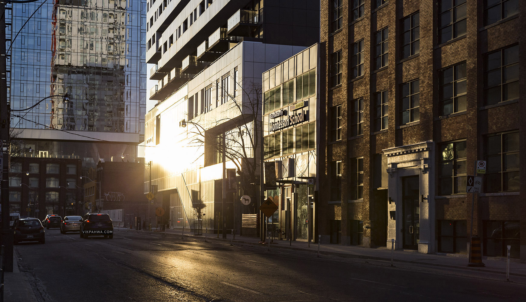 20170318. A setting sun shines on both the Picasso Condos and it