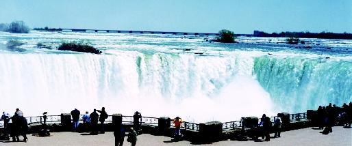 Niagara Falls is located on the international line between the cities of Niagara Falls, New York, and Niagara Falls, Ontario. This world-famous tourist destination, like other Great Lakes attractions, bolsters the local and regional economies of both countries.