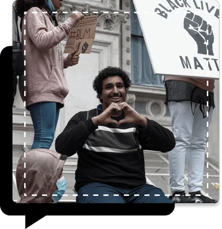 Image of a man making a heart shape with his hands