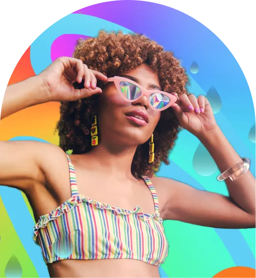 Girl wearing sunglasses in front of a colorful background