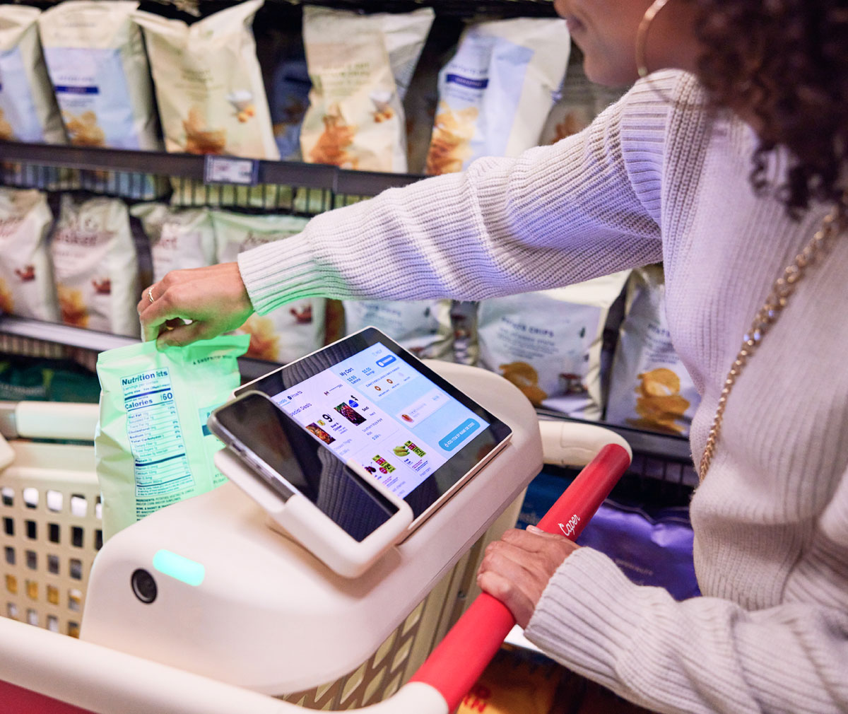 Woman using Caper Cart Smart Cart