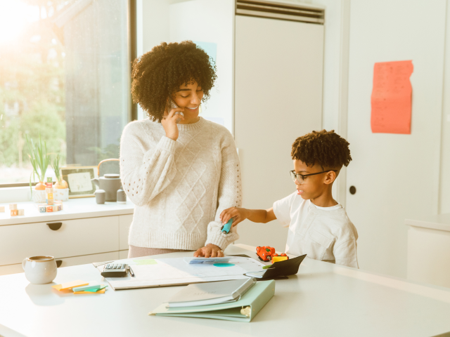 Woman and child at kitchen counter