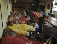 Members of the Womens Auxiliary Air Force (WAAF) repair and pack parachutes for use by airborne troops during the Normandy invasion. (May 31, 1944). Source: Imperial War Museums,  TR 1783.