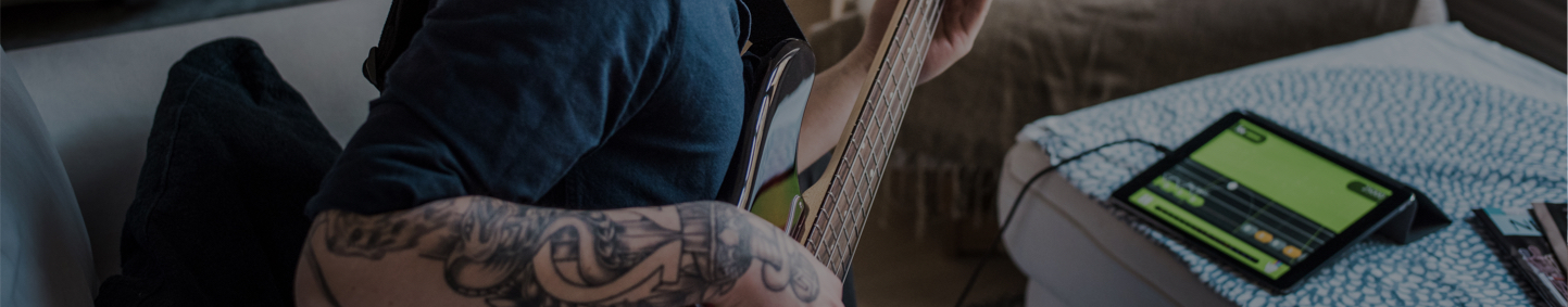 Guy playing guitar