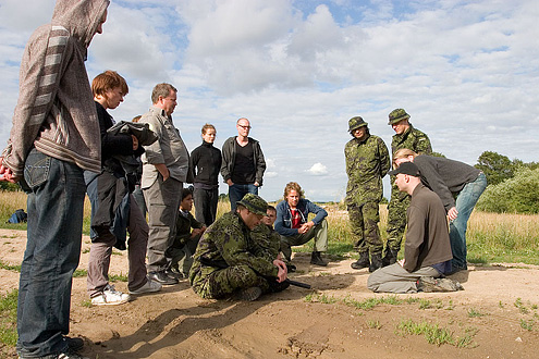 Director Tom Vilhelm Jensen directs the actors and crew.