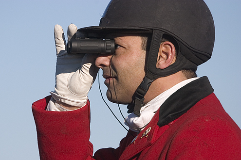 Rider with binoculars