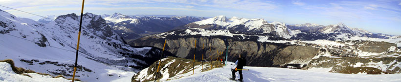 Panorama view from the black slope Coupe de Monde towards the Morzine valley. The slope ends in Morzine. To the right on the city of Avoriaz can be seen - located above the cliffs. The view is quite spectacular.