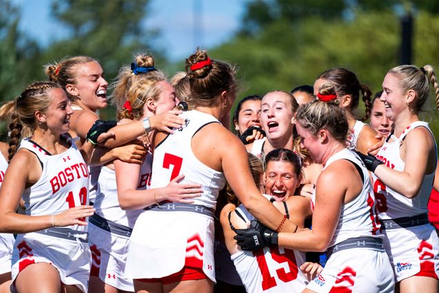 The field hockey team celebrates a shoot-out victory over Brown University September 8. Katie Devine (CAS’25) scored two goals and converted in the shootout to help the Terriers break a two-game losing streak. Photo by Jon Ratner