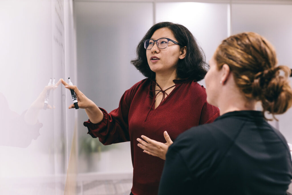 faculty at whiteboard