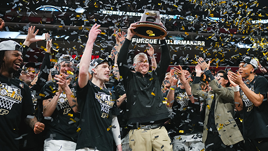 Head coach Matt Painter and the Boilermaker men’s basketball team celebrating their Elite Eight March Madness win.