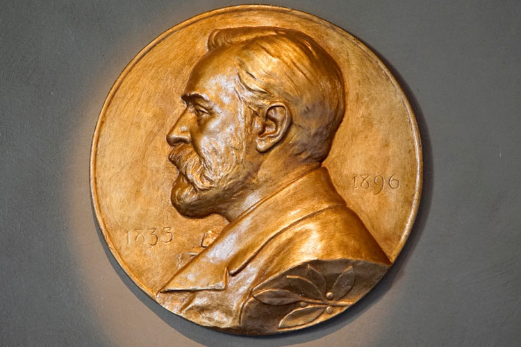 bronze circular medal with engraving of Alfred Nobel