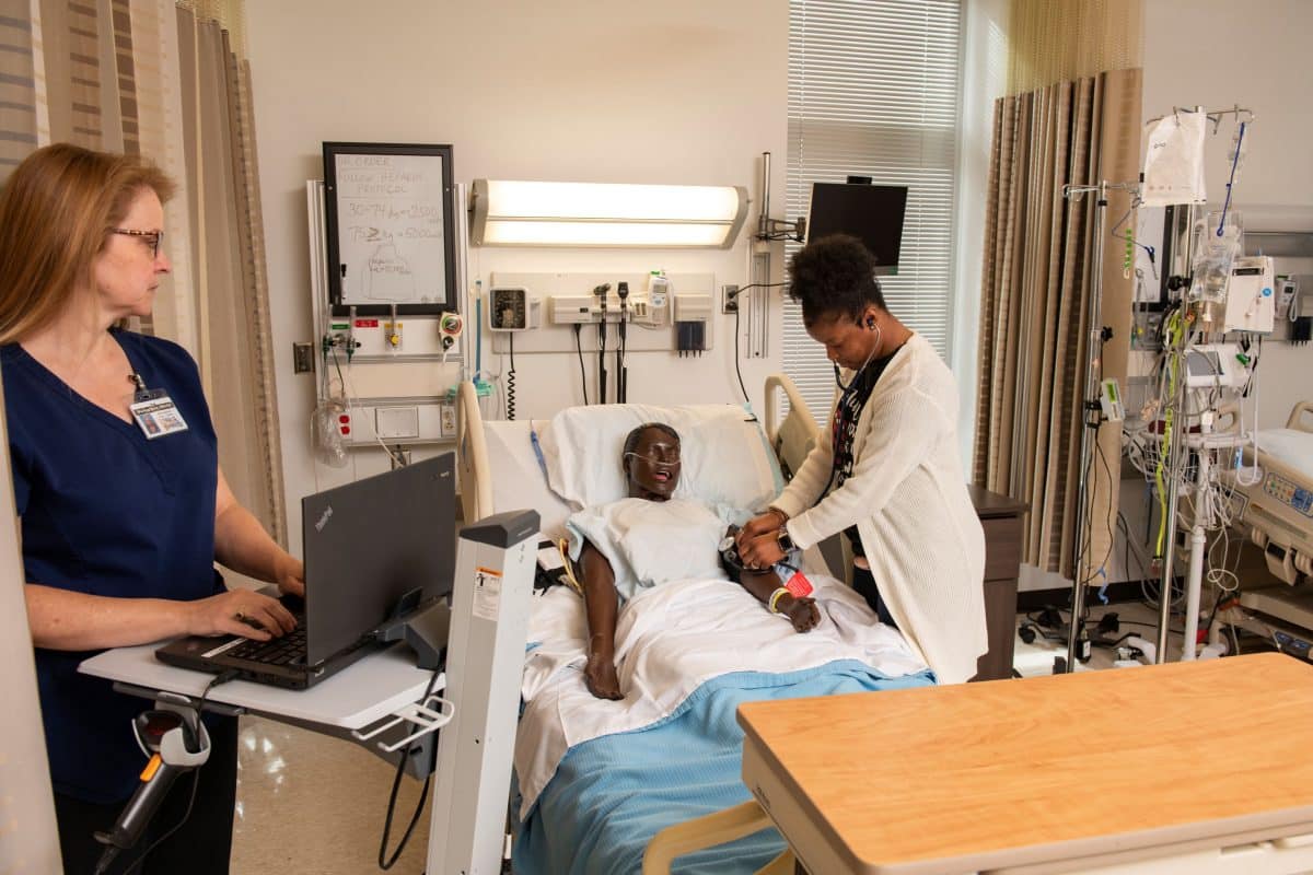 Registered Nursing student practicing on a test patient