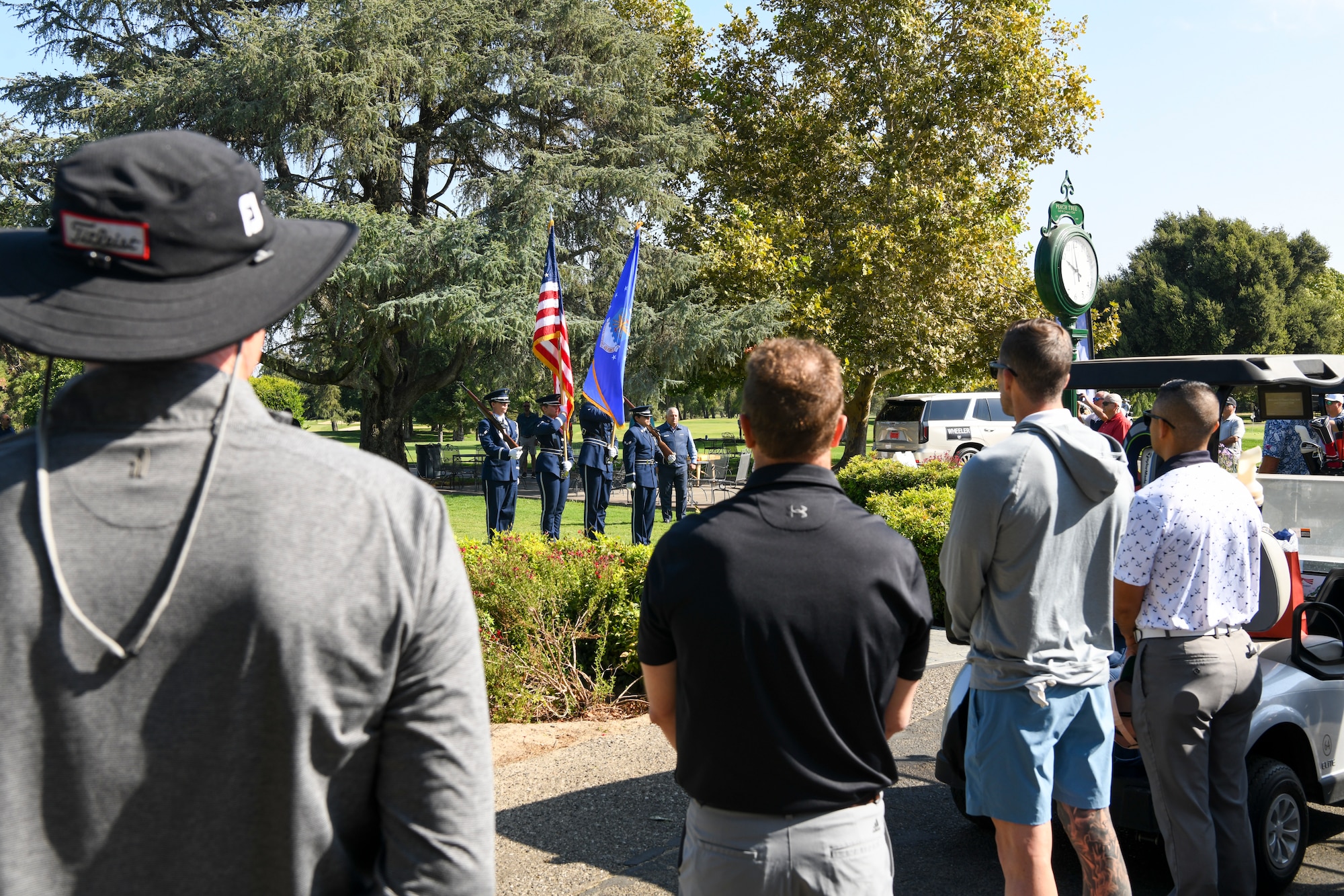 The U.S. Air Force 9th Reconnaissance Wing Honor Guard displays the U.S. flag and Air Force flag during the national anthem for the opening ceremony of the annual Patriotic Golf Tournament in Marysville, California, Aug. 23, 2024.