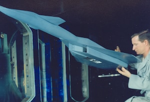 A technician makes adjustments to a scale model of the XB-70 Valkyrie before aerodynamic characteristics related to the aircraft are evaluated in Tunnel A of the von Kármán Gas Dynamics Facility at Arnold Air Force Base, Tenn., headquarters of Arnold Engineering Development Complex, in 1959. Beginning in the late 1950s and continuing through the mid-1960s, tests were conducted at Arnold Air Force Base, Tenn., headquarters of Arnold Engineering Development Complex, in support of the XB-70 program. Only two Valkyries were built, with only one of the pair remaining. The now-retired aircraft made its first flight on Sept. 21, 1964. (U.S. Air Force photo)