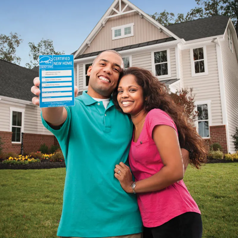 smiling couple with certification