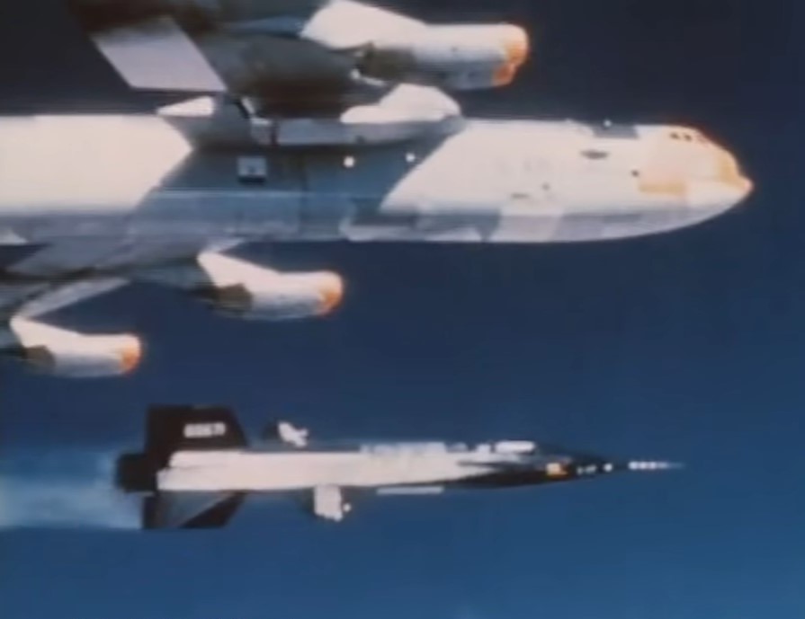 The X-15 drops from the B-52 carrier aircraft to begin its first powered flight.