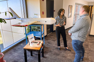 Parikha Mehta and Wayne Mackenzie discussing Dr. Bianca Baier’s innovative AirCore atmospheric sampling device and the HORUS glider at the NOAA Global Monitoring Laboratory in April 2023.