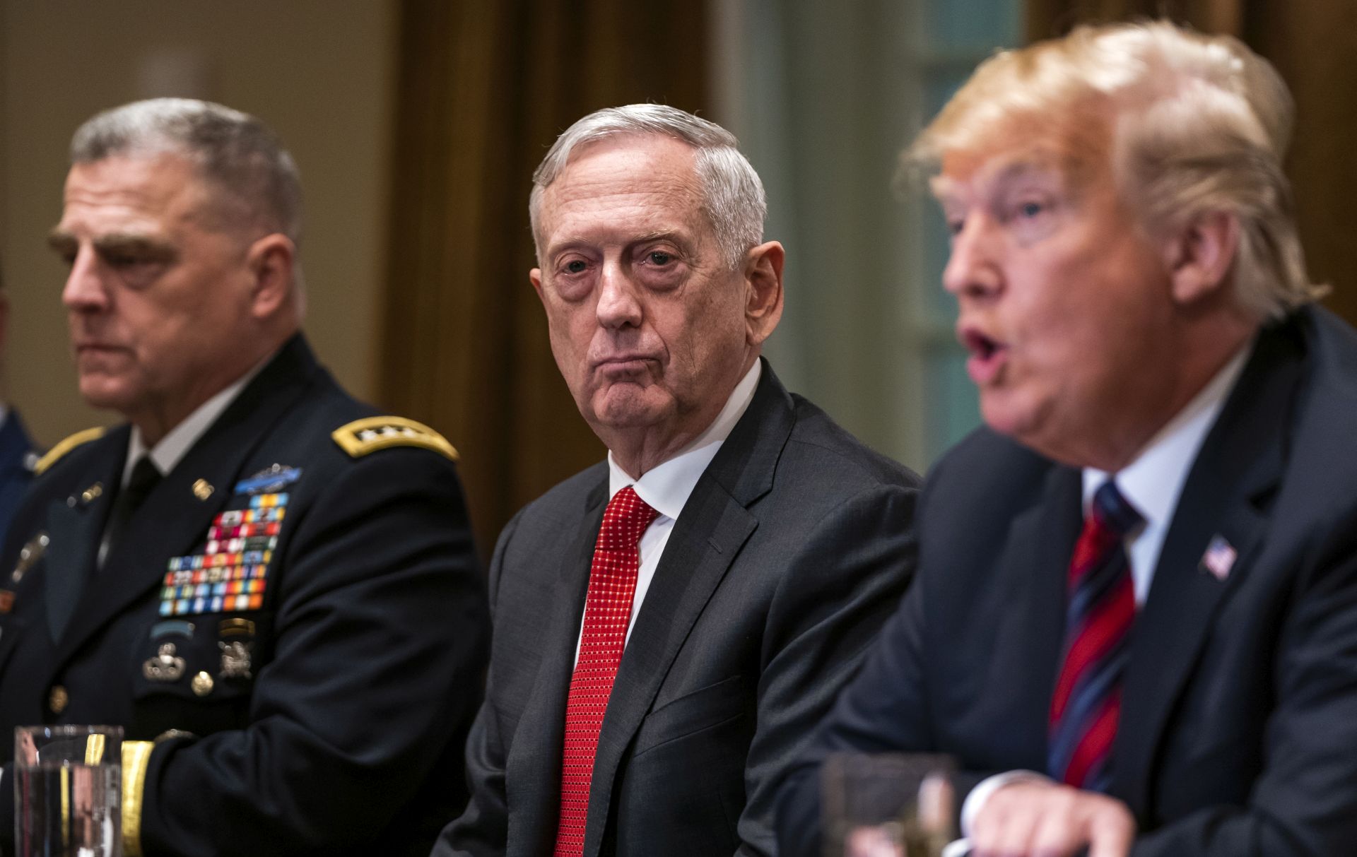 epa07242840 (FILE) - US Defense Secretary James Mattis (C) listens to President Donald J. Trump (R) speaking to the media before meeting with senior military advisors in the Cabinet Room of the White House in Washington, DC, USA, 23 October 2018 (re-issued 20 December 2018). Media reports on 20 December 2018 state that US Secretary of Defense James Mattis is retiring at the end of February 2019 citing the announcment from a tweet by US President Donald J. Trump.  EPA/JIM LO SCALZO