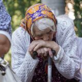 epa11555111 A woman evacuated from the Kursk regional border with Ukraine waits to receive humanitarian aid delivered by the Russian Red Cross in downtown Kursk, Russia,19 August 2024. The Assumption-Nikitsky Church is regularly visited by refugees from the Kursk region, where they receive humanitarian aid. Since evacuations began amid a Ukrainian offensive in the area, more than 121,000 people have been resettled from nine border areas. The resettlement of residents from border areas continues, the press service of the Russian Emergencies Ministry reported.  EPA/STRINGER