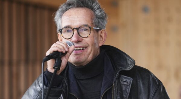 Danish author Carsten Jensen speaks during the happening 'Funeral for Vejle Fjord' in Vejle, Denmark, on April 6, 2024.  Environmental activists and a priest organize the "funeral" of a fjord, whose ecosystem has succumbed to human activity, according to the Greenpeace NGO, which organised the event.
For biologist Stiig Markager, from the University of Aarhus, the fjord is "dead" because "the main components of the ecosystem have reached such a low level that they are no longer fulfilling their role".,Image: 862834791, License: Rights-managed, Restrictions: Denmark OUT
TO GO WITH AFP STORY BY Camille BAS-WOHLERT, Model Release: no, Credit line: Claus Fisker / AFP / Profimedia