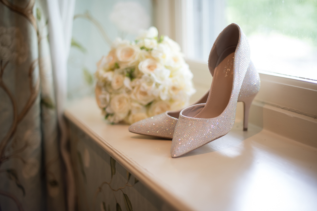 wedding shoes and bouquet