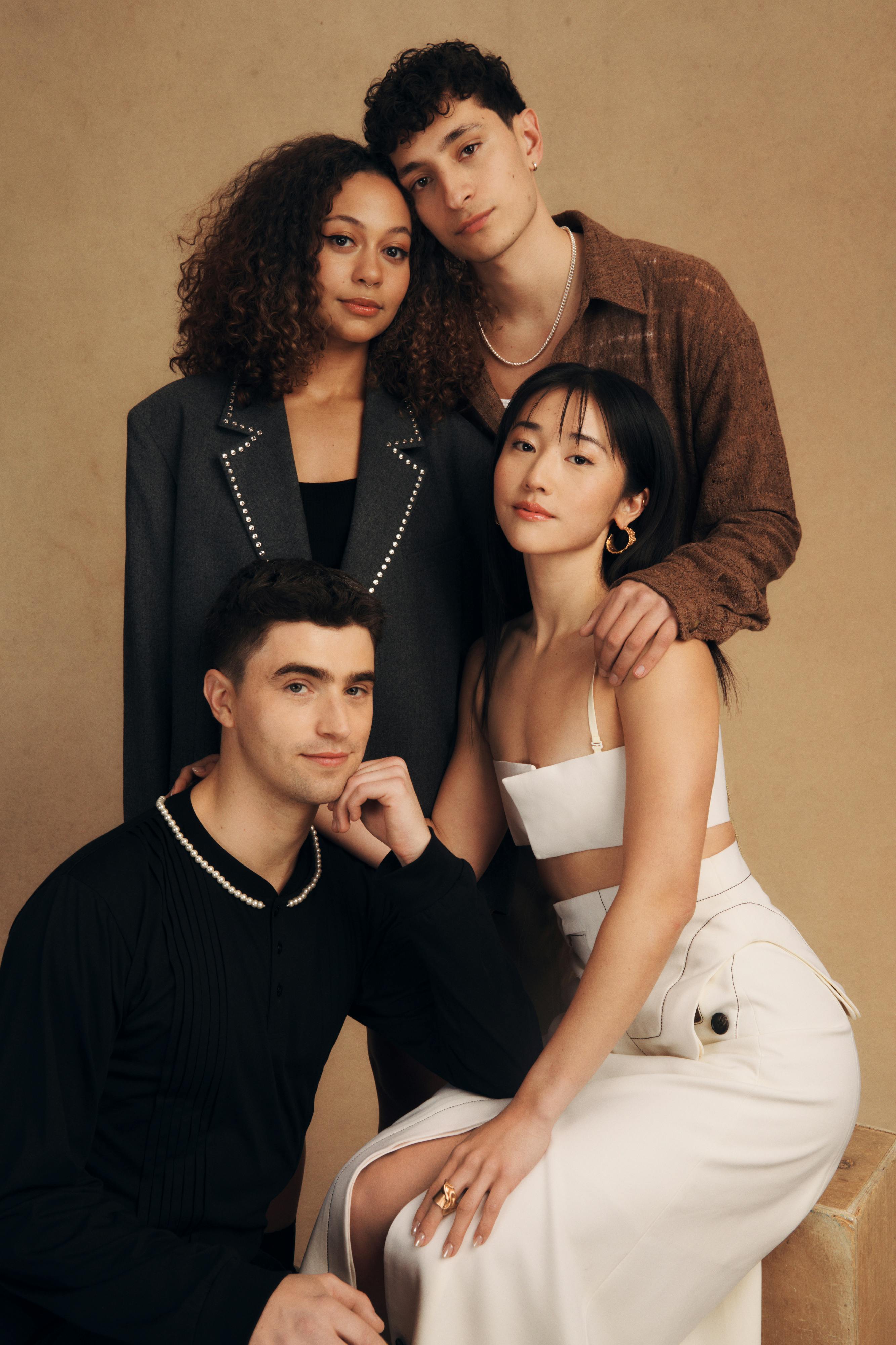 George Rexstrew, Kassius Nelson, Jayden Revri, and Yuyu Kitamura pose against a tan background.