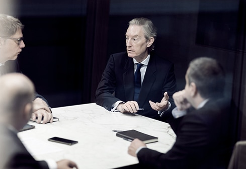 men around table