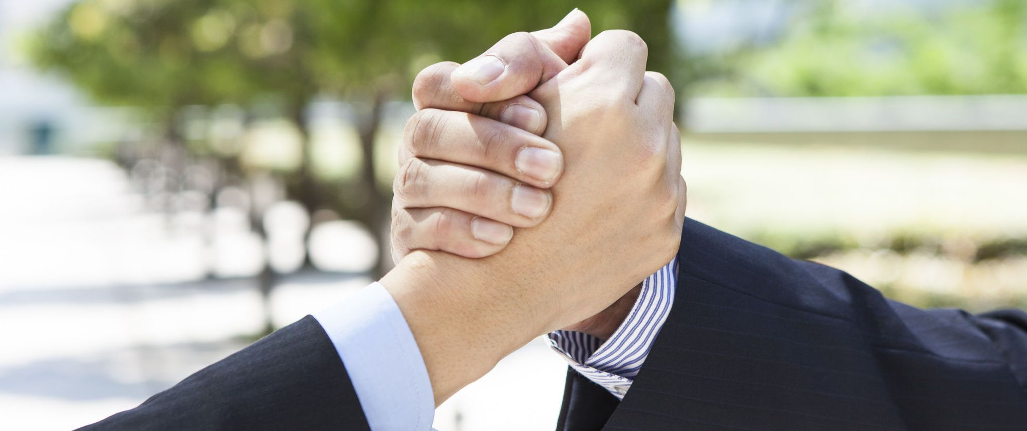 49819413 - business people shaking hands