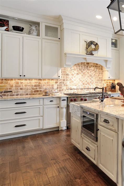 Whitewashed Brick Backsplash Dark Plank Floor Wintage Look Cabinets ...