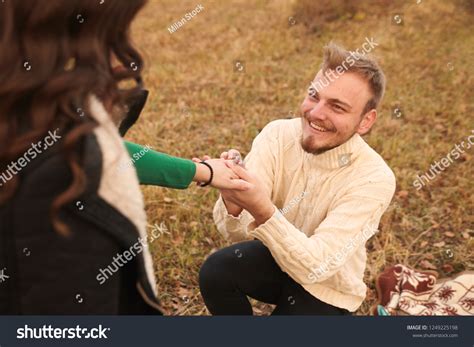 Young Smiling Happy Man Kneeling Proposing Stock Photo 1249225198 ...