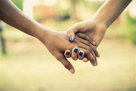 Two People Holding Hands · Free Stock Photo