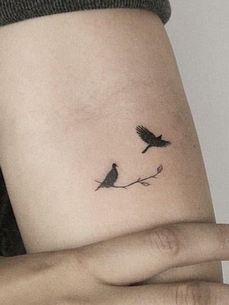 Share more than 76 small black bird tattoo super hot - in.coedo.com.vn