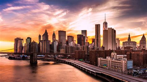 Download New York City Skyline Sunset Wallpaper | Wallpapers.com