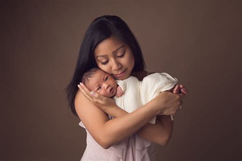 Mother And Newborn Baby Photography