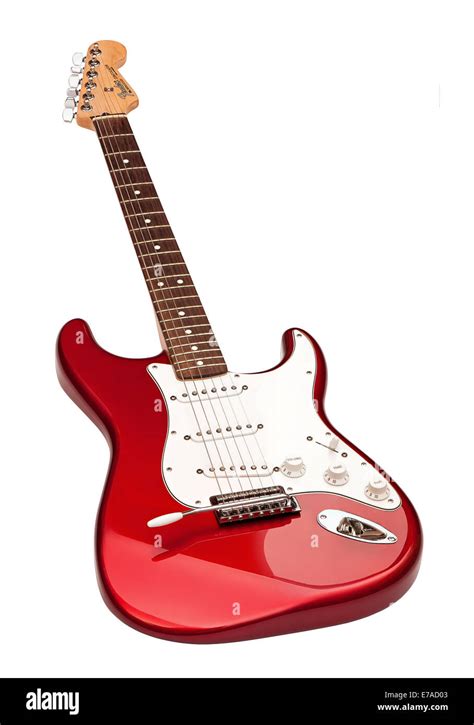 red six-stringed electric guitar isolated on white background Stock ...