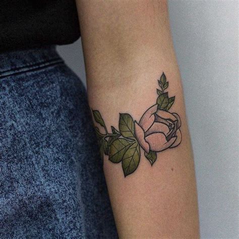 Little rosebud tattoo inked on the left forearm | Pink rose tattoos ...