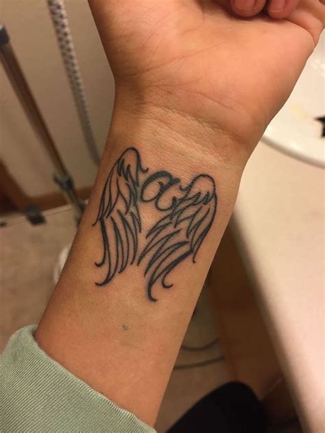 1001 + ideas for a beautiful and meaningful angel wings tattoo