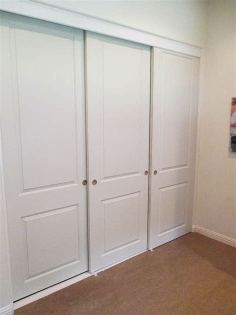 3-panel, 3-track Molded Panel Closet Doors are a popular choice among ...