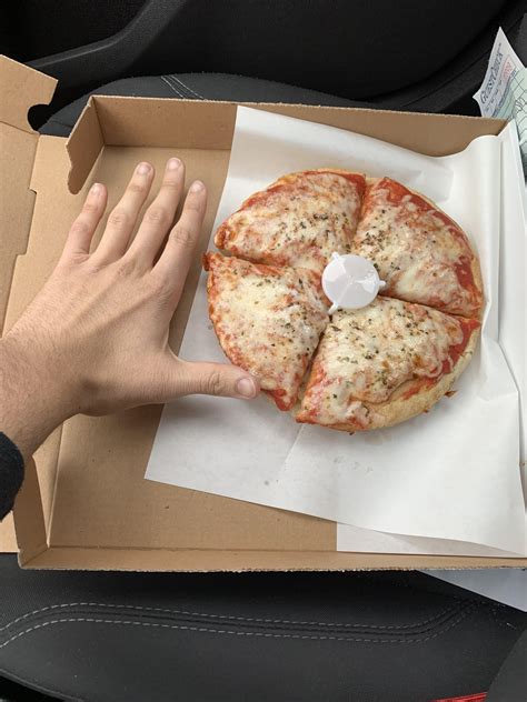 Calories in 8 inch deep dish? Hand for comparison lol : r/caloriecount