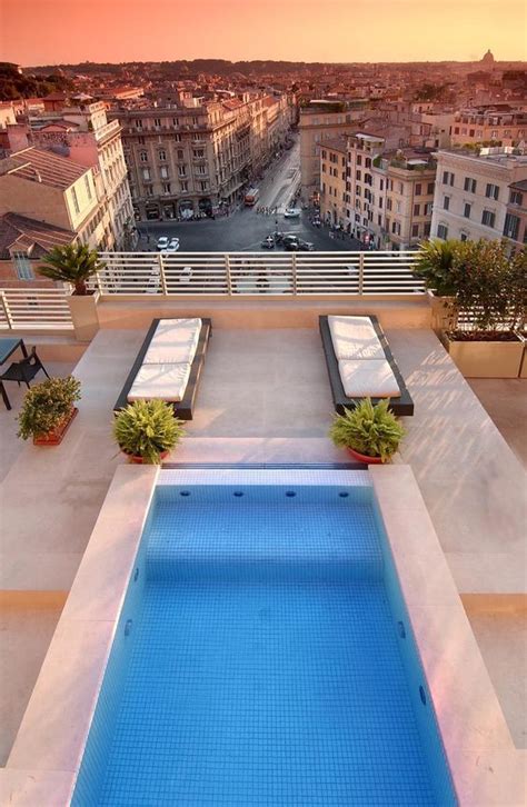 an empty swimming pool on top of a building