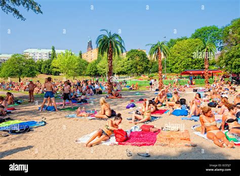 Sweden, Stockholm - People Sunbathing on Beach at Hornstull in Summer ...